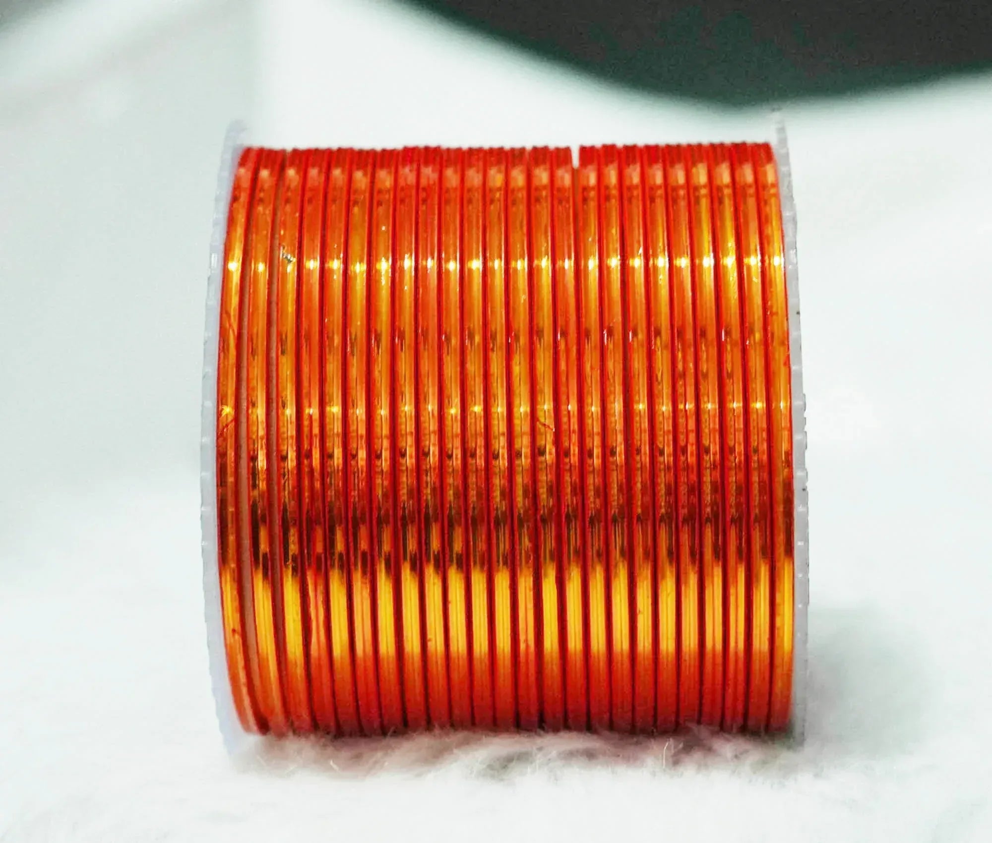 Orange Color Glossy Metal Bangle for Women & Girls (Pack of 24) - The Golden Cascade